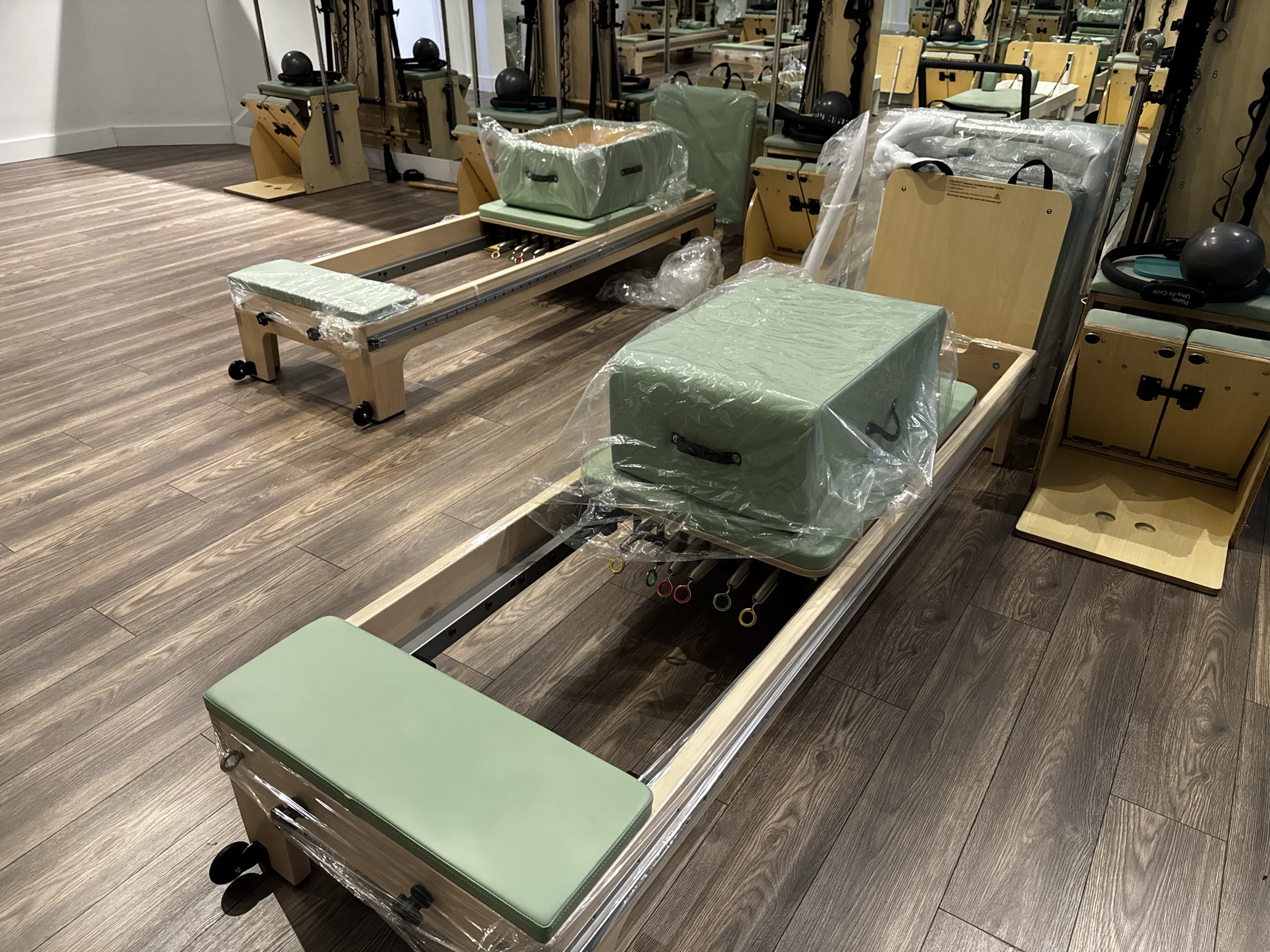 Custom mint-green Elina Pilates equipment