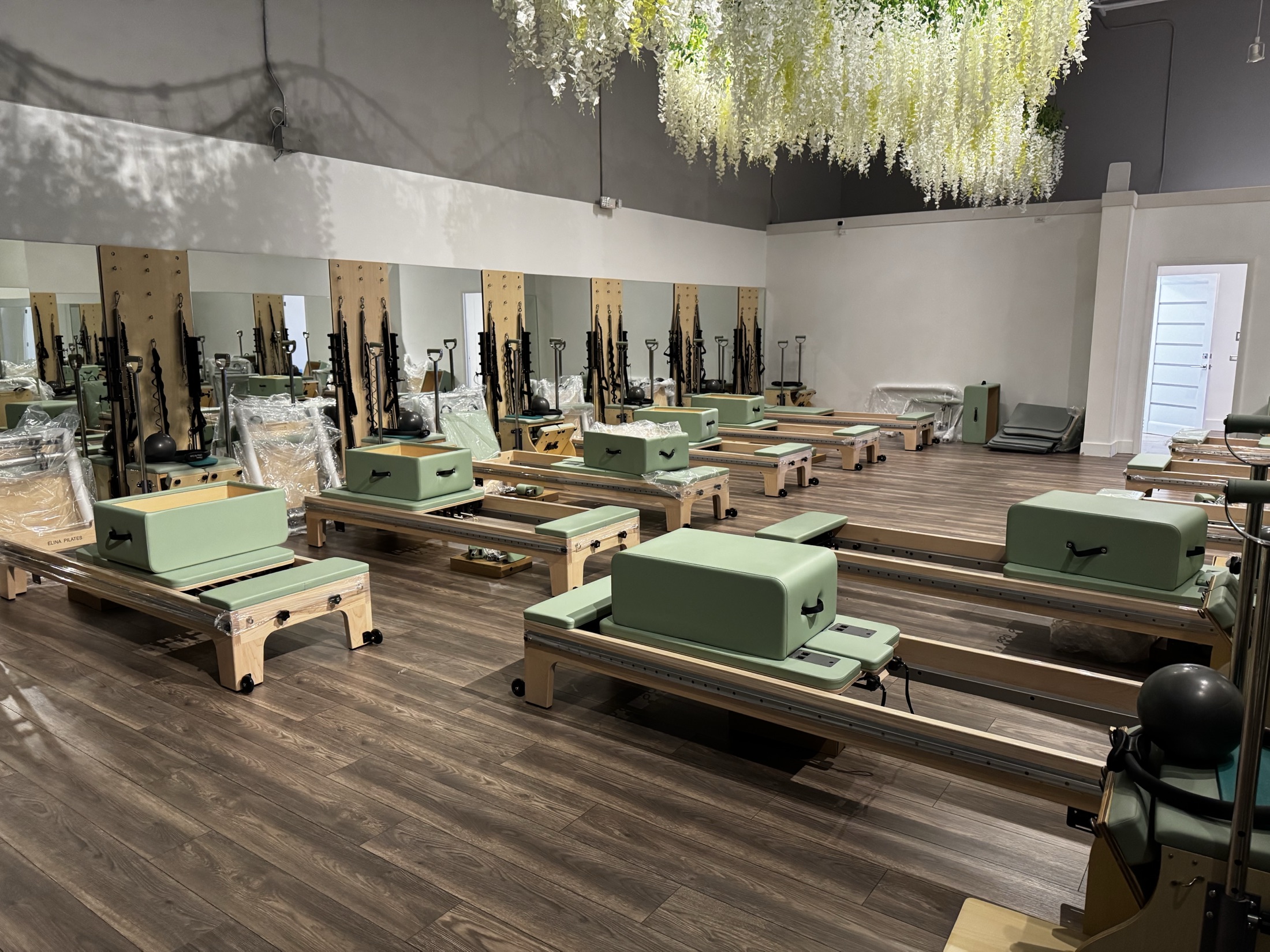 Custom mint-green Pilates studio